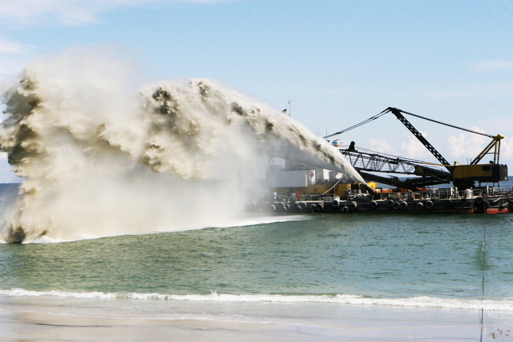 Hydraulic dredging with cutter suction dredgers enables direct slurry discharge for beach nourishment. This high-capacity dredge method ensures efficient sediment removal along coastlines.