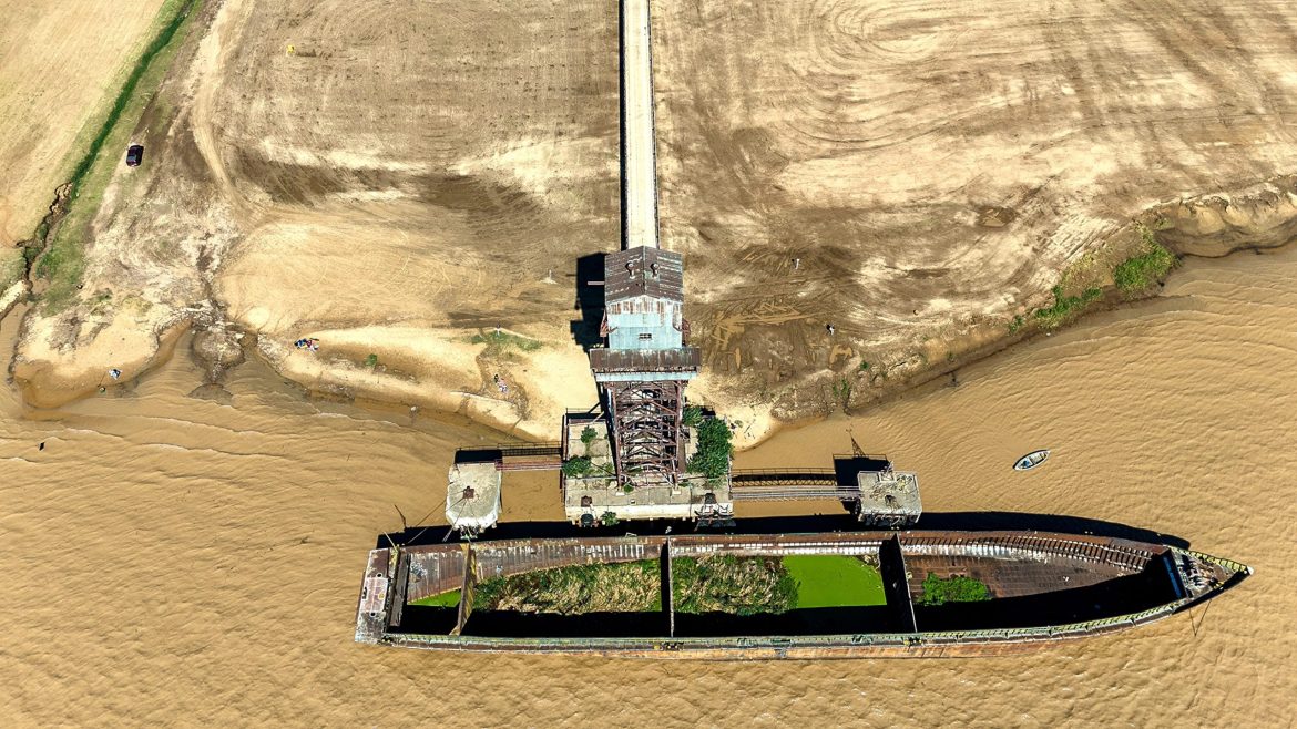 Floating breakwaters are buoyant structures designed to reduce wave energy and protect vulnerable coastlines. They offer effective shoreline protection and help mitigate coastal erosion without disrupting natural sediment flow.