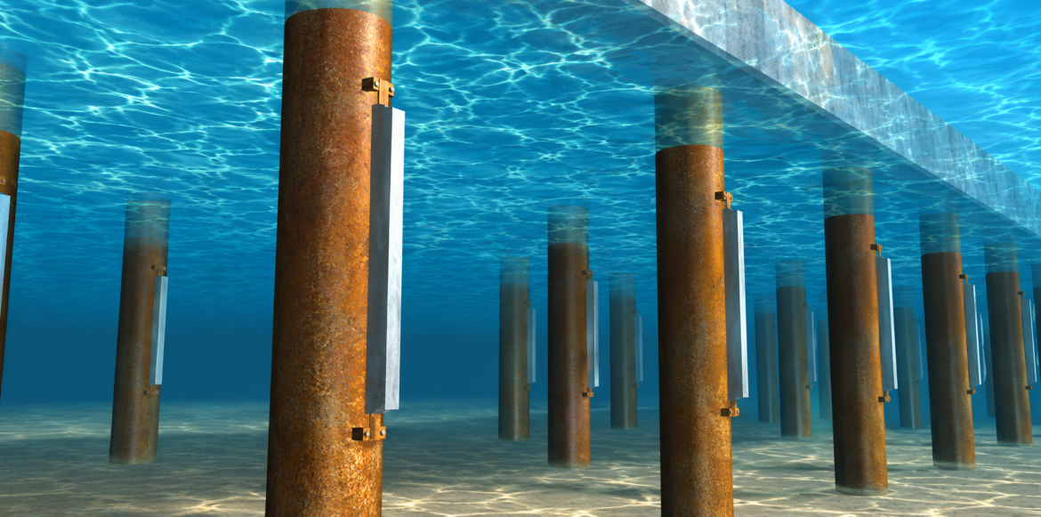Cathodic protection reduces corrosion by shifting the electrochemical potential of steel to suppress metal dissolution. It is widely applied to submerged and buried steel components in marine infrastructure, including piles, harbour installations, and offshore structures.