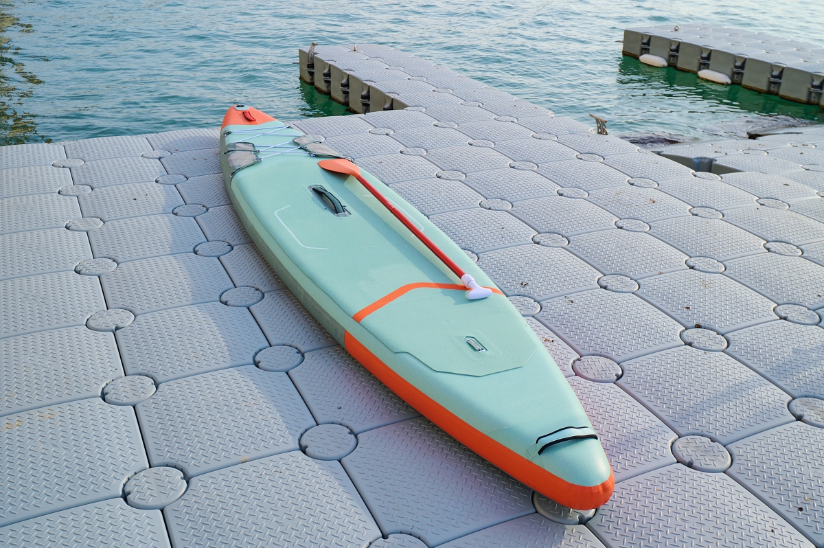 Floating docks rise and fall with changing water levels, helping maintain a relatively consistent relationship between the dock and moored vessels. Fixed docks remain at one elevation, so the vertical distance between the deck and vessel changes with the water level.